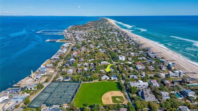 bird's eye view with a water view and a view of the beach