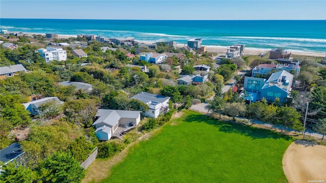 bird's eye view featuring a water view and a view of the beach