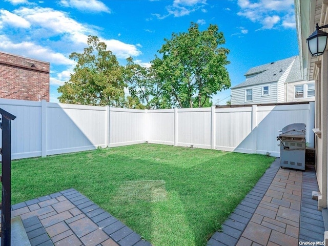 view of yard with a patio area