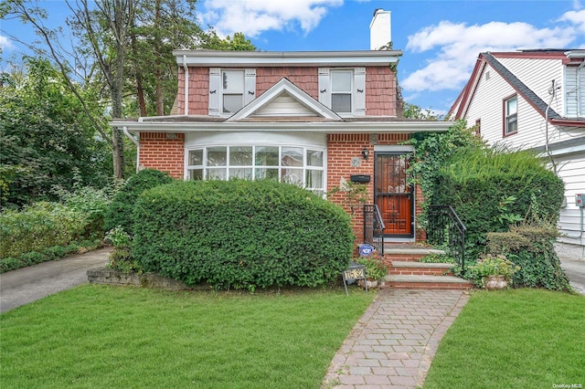 view of front of house with a front yard