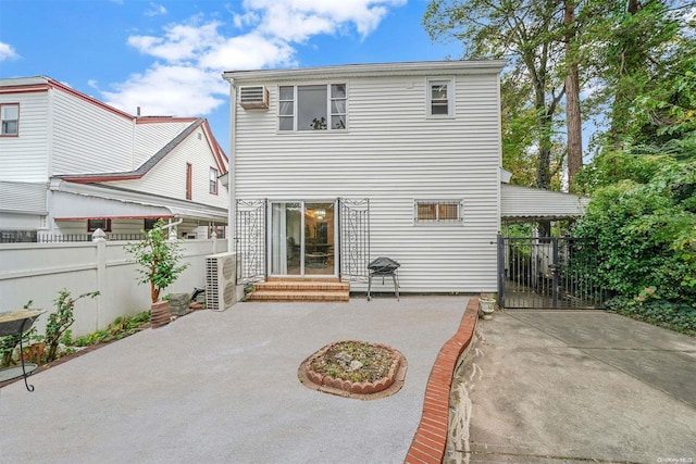 rear view of house featuring a patio area