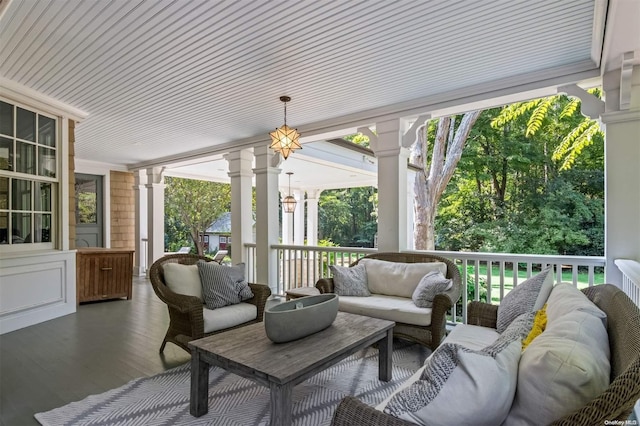 sunroom featuring wood ceiling