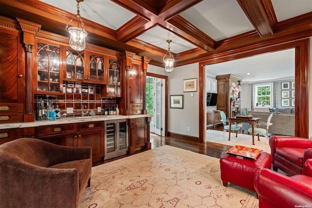 bar featuring beverage cooler, hanging light fixtures, coffered ceiling, beamed ceiling, and hardwood / wood-style flooring