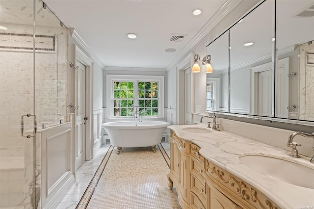 bathroom featuring plus walk in shower, vanity, and ornamental molding