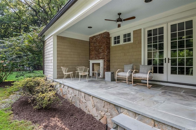 view of patio / terrace with ceiling fan and french doors