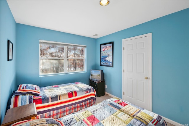 bedroom featuring carpet flooring