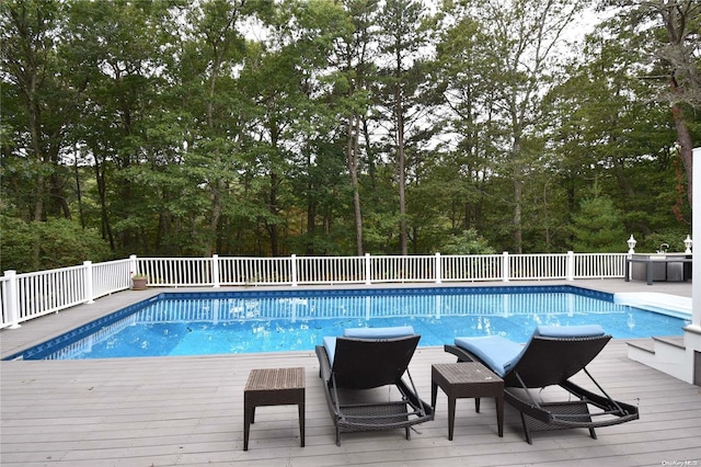 view of pool with a deck