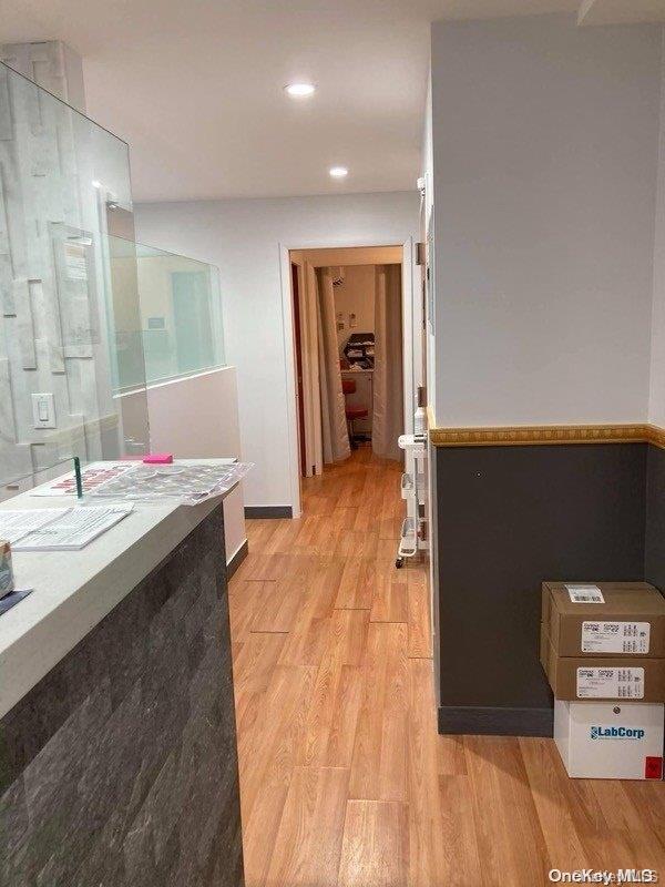 bathroom with wood-type flooring