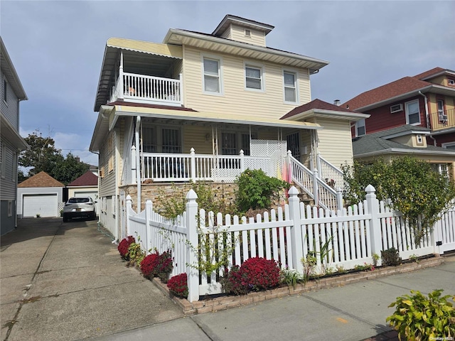 view of front facade featuring a balcony and covered porch