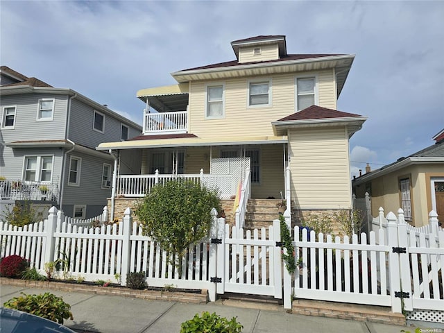 view of front facade with a balcony