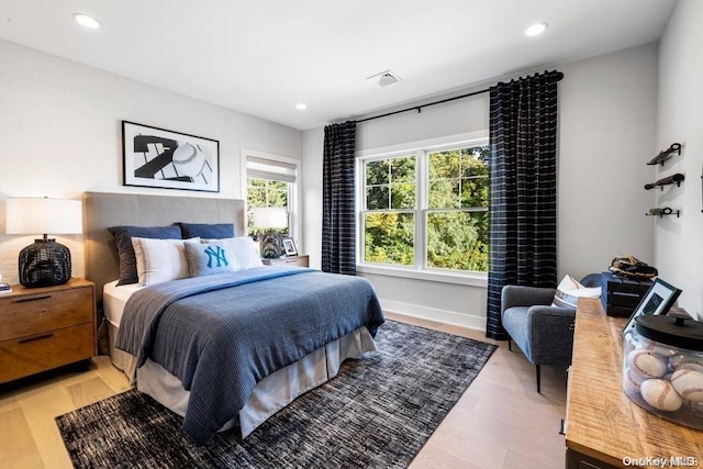 9 Sienna/ Ct, Dix Hills, NY 11746 - bedroom with light wood-type flooring, recessed lighting, and baseboards