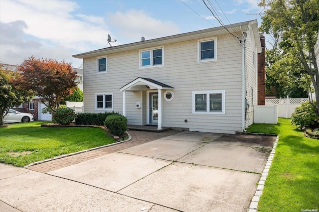 view of front facade with a front yard