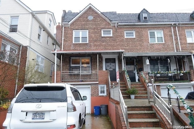 view of property with covered porch