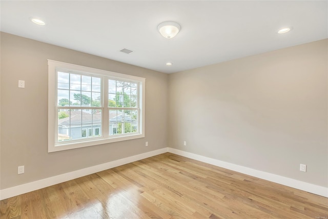 empty room featuring light hardwood / wood-style floors