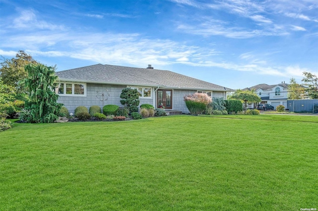 view of front facade featuring a front yard