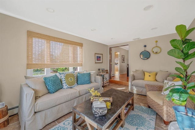 tiled living room featuring baseboard heating