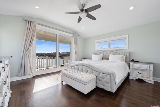 bedroom featuring access to exterior, dark hardwood / wood-style floors, multiple windows, and lofted ceiling