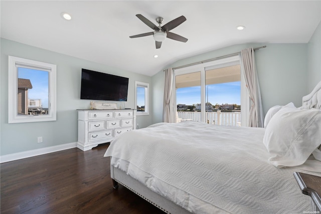 bedroom featuring access to exterior, dark hardwood / wood-style flooring, vaulted ceiling, and ceiling fan