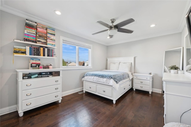 bedroom with dark hardwood / wood-style floors, ceiling fan, and crown molding