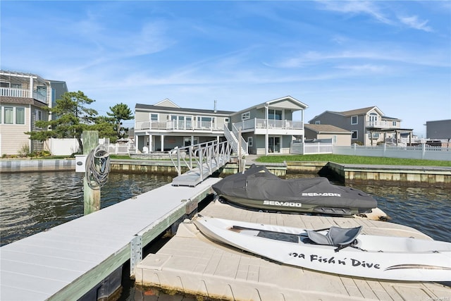 dock area with a water view