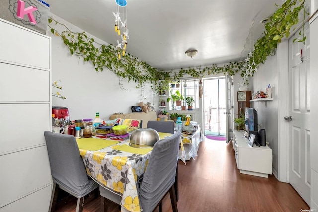 dining space with dark wood-type flooring