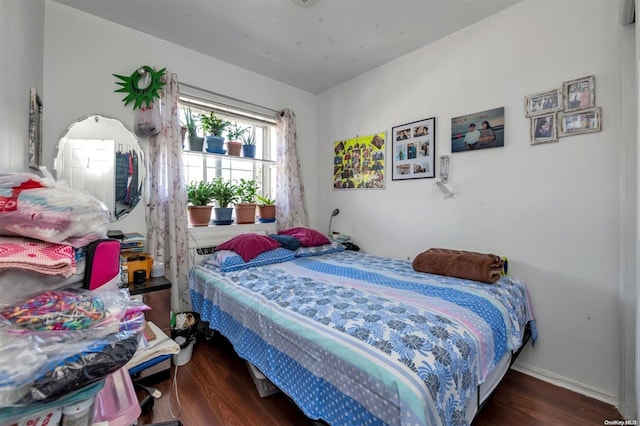 bedroom featuring dark hardwood / wood-style floors