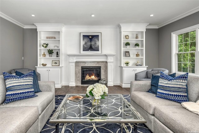 living room featuring a fireplace, crown molding, and dark wood-type flooring