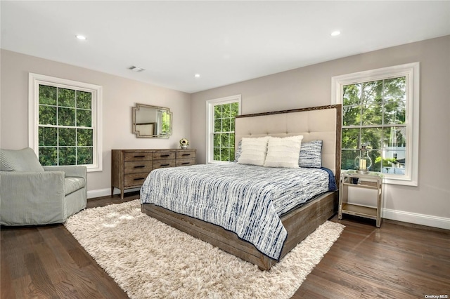 bedroom featuring dark wood-type flooring