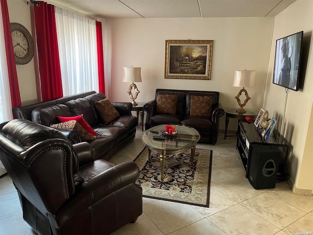 living room with light tile patterned flooring