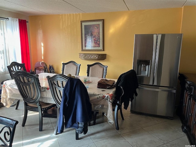 dining room featuring tile patterned flooring