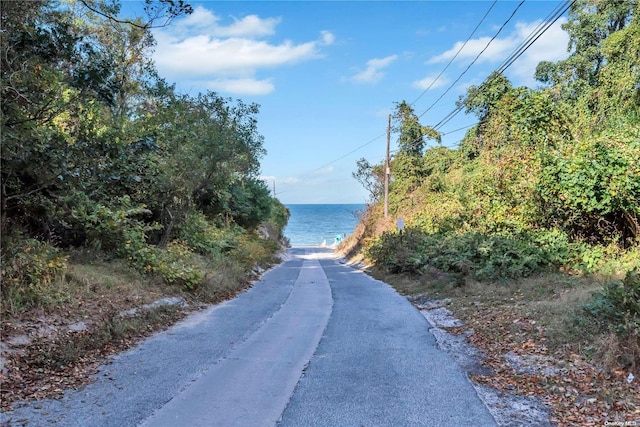 view of road featuring a water view