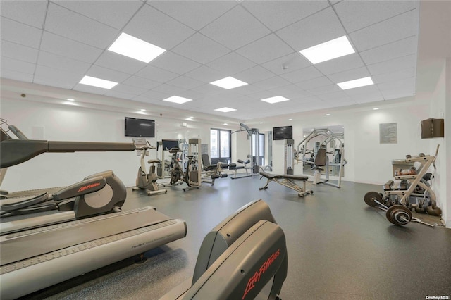 workout area with a drop ceiling