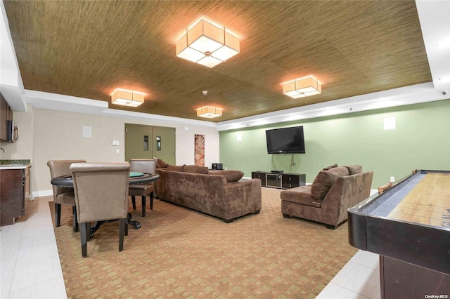 living room with a tray ceiling