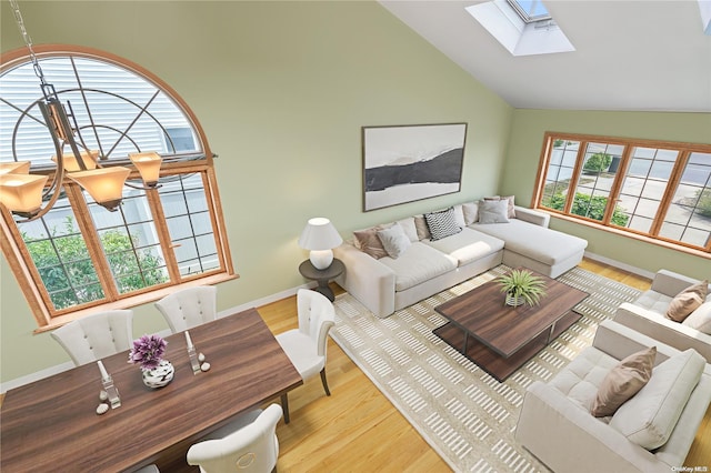 living room featuring light hardwood / wood-style floors, high vaulted ceiling, and a skylight