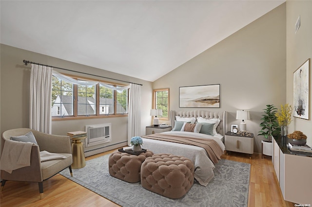 bedroom with a baseboard radiator, light hardwood / wood-style floors, an AC wall unit, and high vaulted ceiling