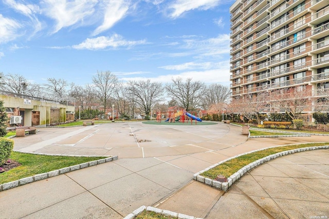 view of property's community with a playground