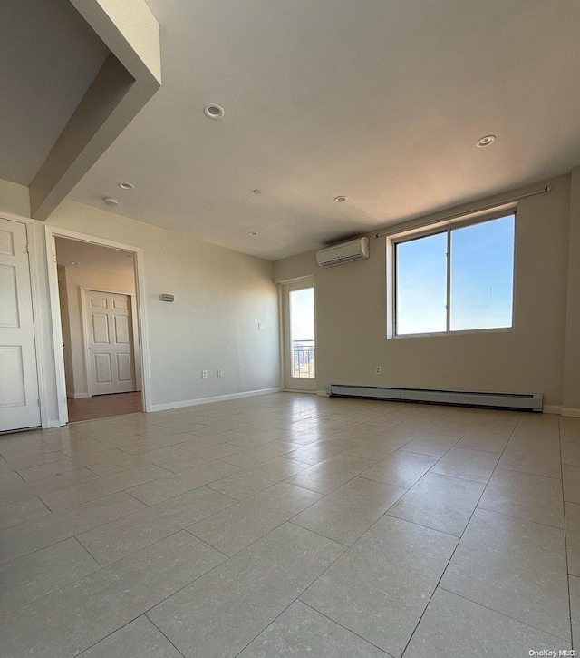 tiled empty room featuring baseboard heating and a wall mounted air conditioner