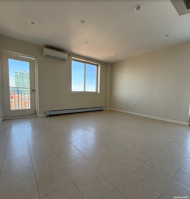 unfurnished room with a wall unit AC, a wealth of natural light, light tile patterned floors, and a baseboard radiator