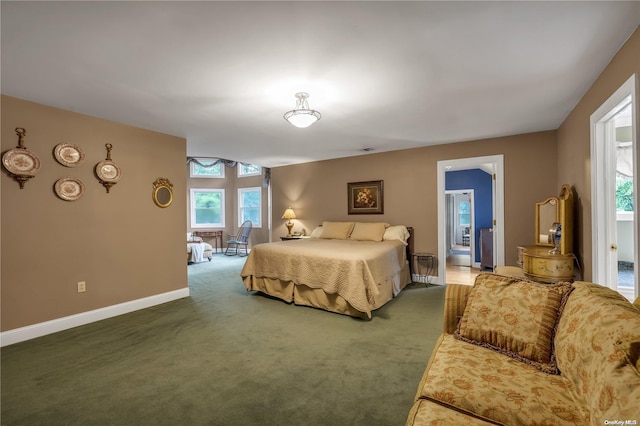 bedroom featuring dark colored carpet