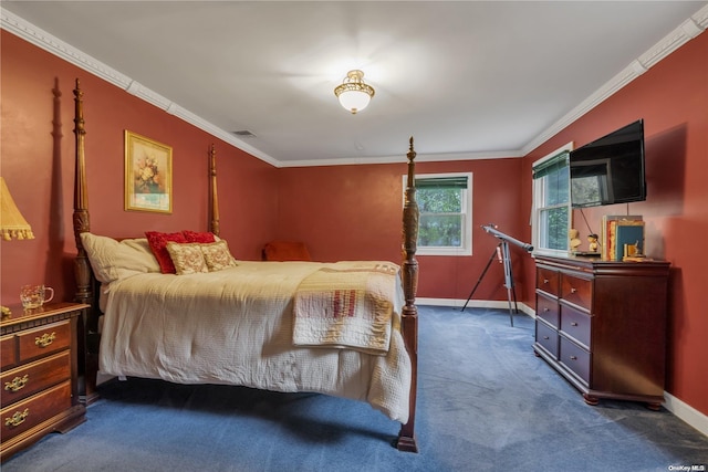 carpeted bedroom featuring crown molding