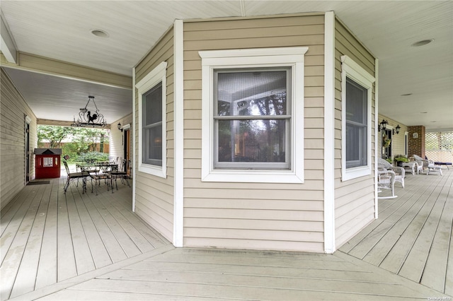 wooden deck featuring covered porch