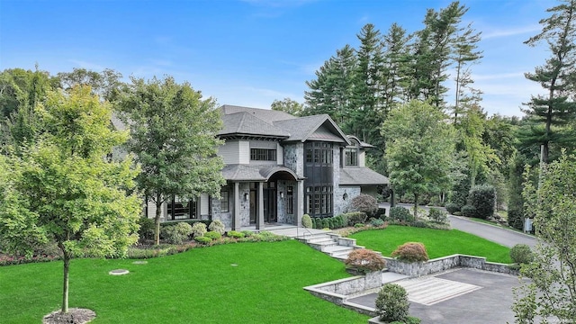 view of front of home with a front yard