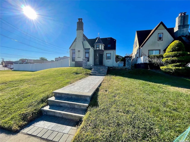 view of front of house with a front lawn