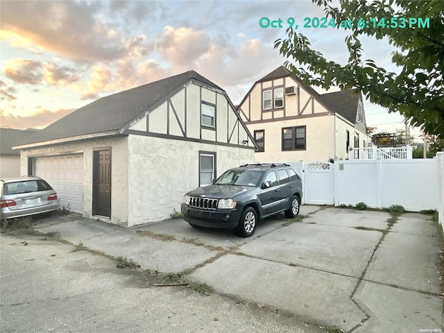 view of front of property with a garage