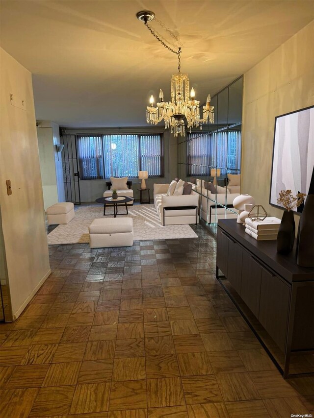 living room featuring an inviting chandelier