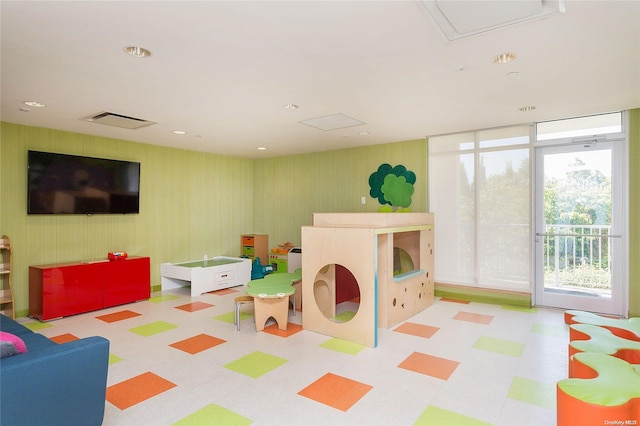 recreation room featuring expansive windows