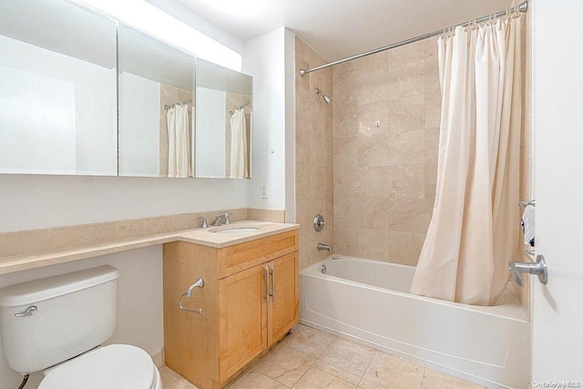 full bathroom with toilet, vanity, and shower / bath combo with shower curtain