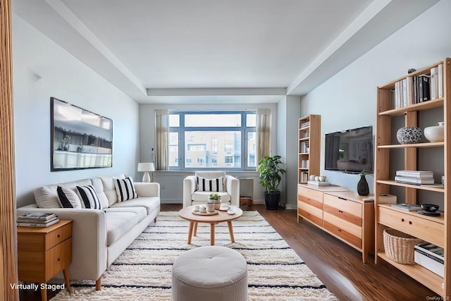 living room featuring dark wood-type flooring