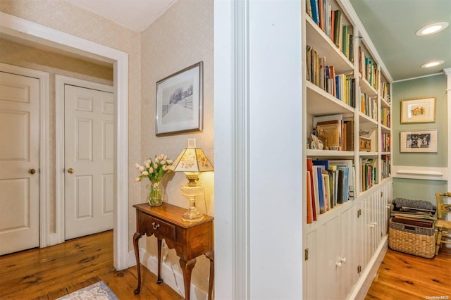 hallway featuring hardwood / wood-style flooring