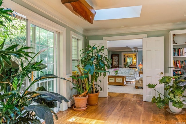 sunroom featuring a skylight